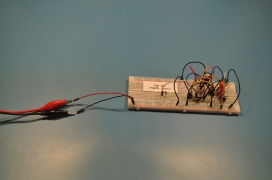 Bench power supply connected with alligator clips and jumpers--How to Power Breadboard Projects Perfect